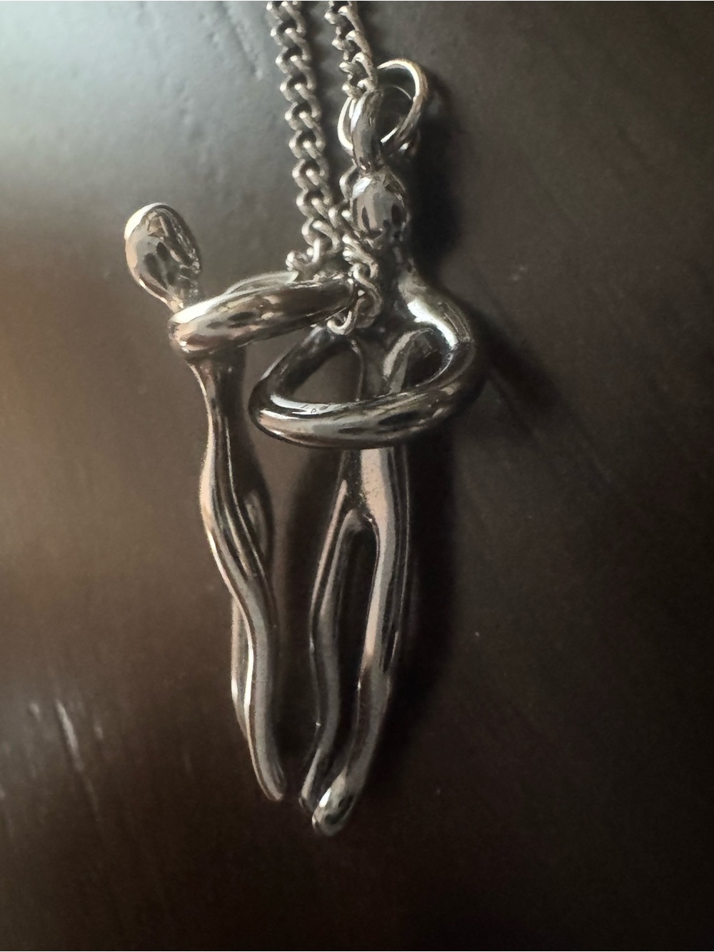 Abstract Embrace Pendant Necklace - Silver Tone